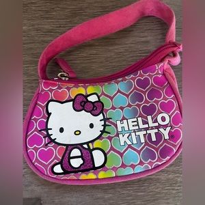 Hello Kitty handbag from 1976,2012Petite purse!
Clean interior/minor wear! VGUC!